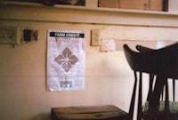 a poster is hanging on the wall of a room